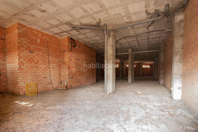 Foto 47389083-13e6-4e68-90ea-159db03fc12c. Local comercial a calle eúfrates 14 a Parque Alcosa Sevilla