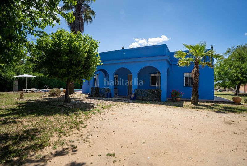 Foto 992d6377-2f29-4eeb-8caf-ebc12cbe4906. Casa amb calefacció aparcament piscina a Marchena