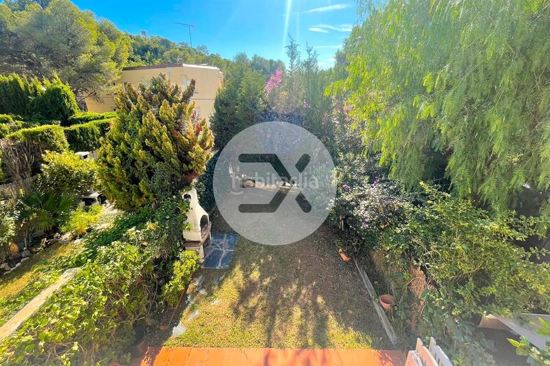 Foto 484588e5-25de-49fb-b44b-9e1236173ec3. Maison jumelée avec cheminée chauffage parking dans Castelldefels