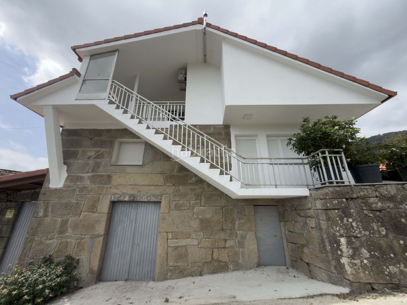 Foto c62ee2c7-6b65-4f12-89cb-fe1750aec779. Casa con parcheggio in Vilaboa