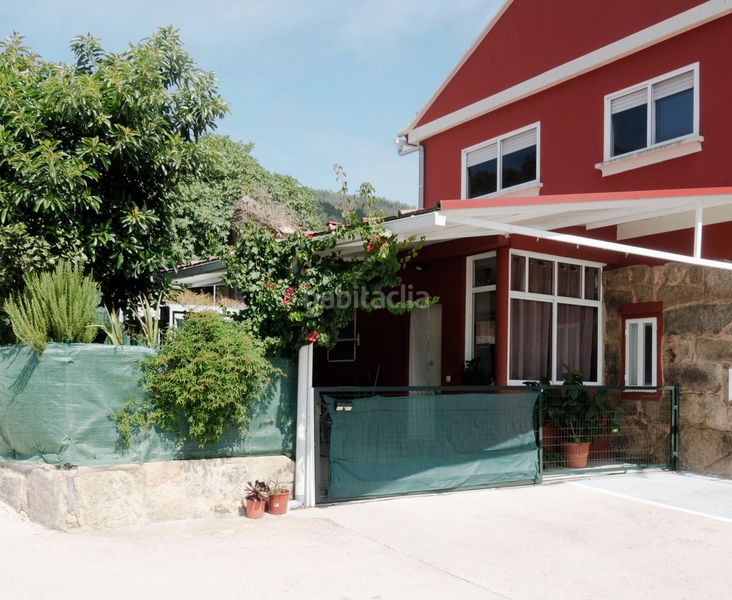 Foto bcea61fa-ba83-429f-a3a1-df579495f568. Casa amb calefacció aparcament a Gondomar