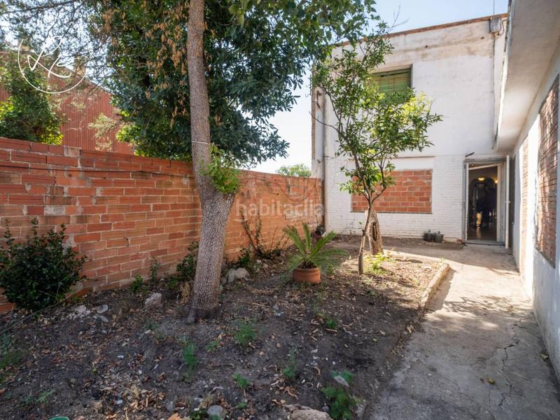 Foto b773bf57-03b8-4f4a-9516-165368c4a431. Casa en tapís 123 casa con jardín y muchas posibilidades en Figueres