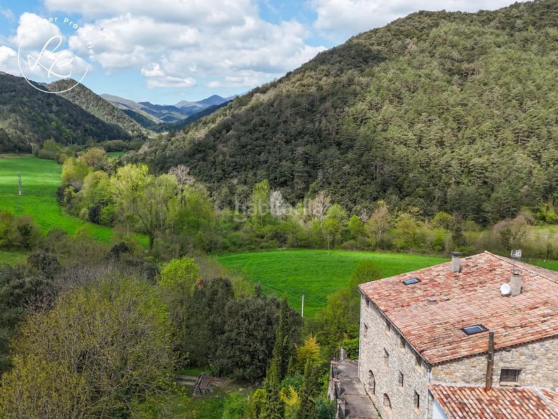 Foto 3e578709-f7f2-49a4-8d52-962a9e743da5. Masia amb calefacció aparcament a Vall de Bianya (La)
