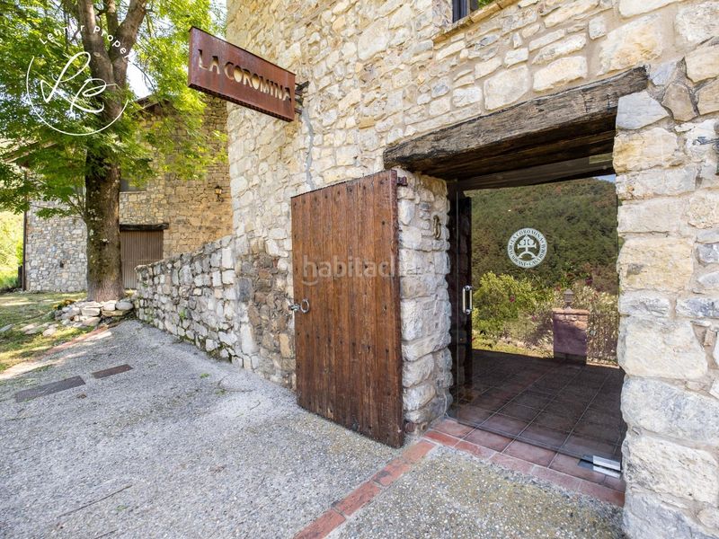 Foto 5be47eb5-ac63-48d4-8a7b-be5ac642e8ff. Masia amb calefacció aparcament a Vall de Bianya (La)