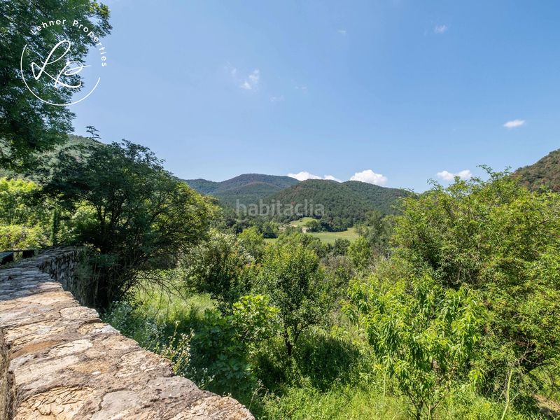 Foto bf13cf17-6880-428e-a5d3-cca6bb3672d5. Masia amb calefacció aparcament a Vall de Bianya (La)