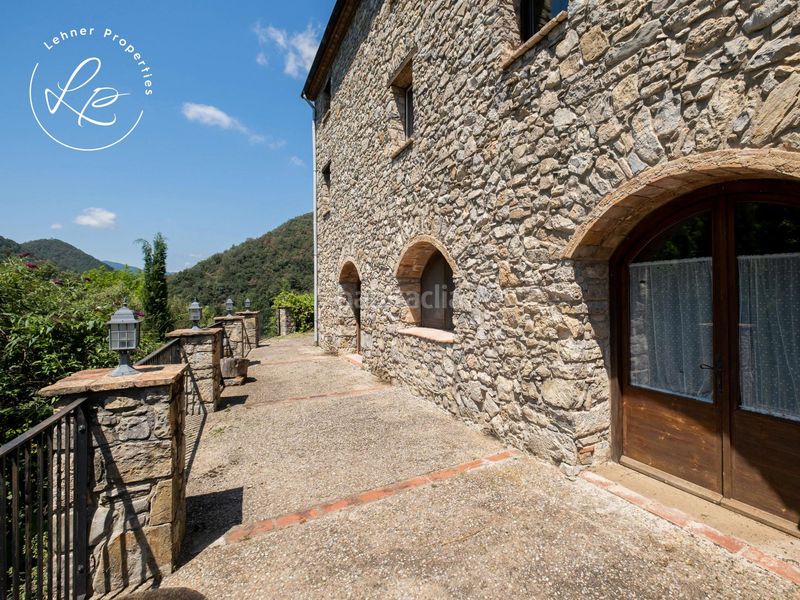 Foto c1d86ab2-ea74-457f-8fec-b61367383a7f. Masia amb calefacció aparcament a Vall de Bianya (La)