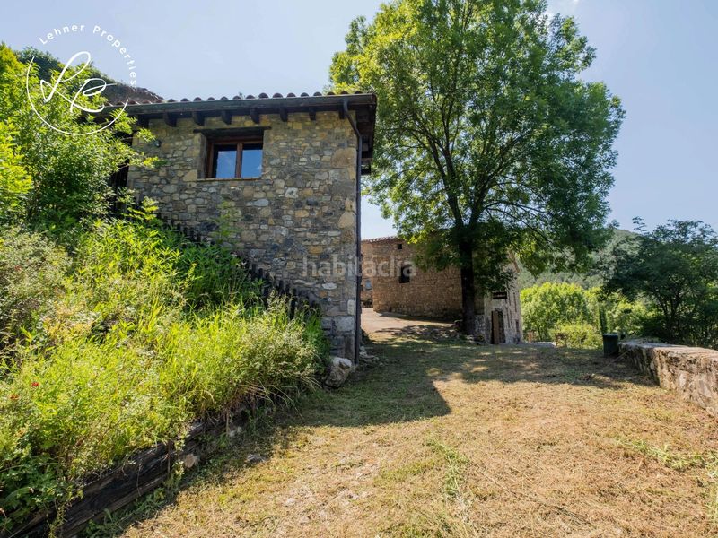 Foto fe91ad35-9302-41c2-a376-18f497d5e8ea. Masia amb calefacció aparcament a Vall de Bianya (La)