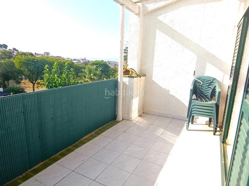 Foto 0d2c2b3c-b8e5-4b43-b237-738565c72fa1. Casa a schiera con parcheggio piscina in Cunit residencial Cunit