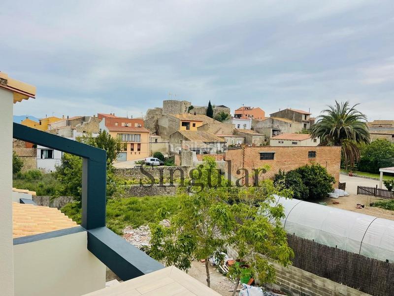 Foto 435daad8-e7de-4bef-ba81-67f5c9ab73b0. Casa adosada descubre tu nuevo hogar en el cautivador casa adosada con garaje privado en Llers