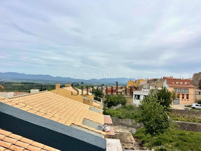 Foto 5990ae92-b48f-45e9-9a86-f3244f5e59a1. Casa adosada descubre tu nuevo hogar en el cautivador casa adosada con garaje privado en Llers