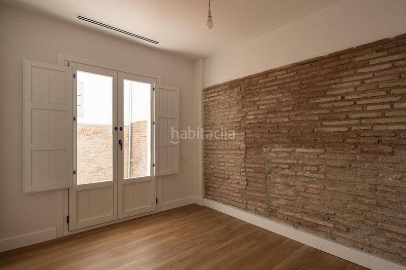 Foto e26bda28-0232-4edc-a31a-72822f2c5407. Piso en calle hotno de vidrio 14 horno de vidrio, monte de piedad 7 y 9 b en Granada