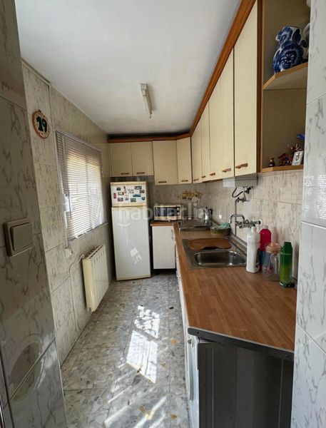 Foto 4e827665-6582-4bb8-a7d8-eb62611c3bd7. Casa adossada amb aparcament a PAU 2-600 Puertollano