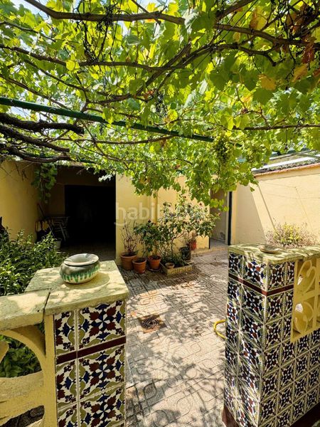 Foto a1b0a6ed-b3d7-41f8-a944-876d855bb995. Casa adossada amb aparcament a PAU 2-600 Puertollano