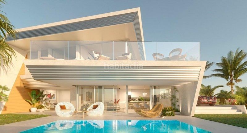 Foto 10a3386b-9403-48a3-b32d-a83d45e3ca93. Doppelhaus mit heizung parking pool in El Faro de Calaburra - Chaparral Mijas