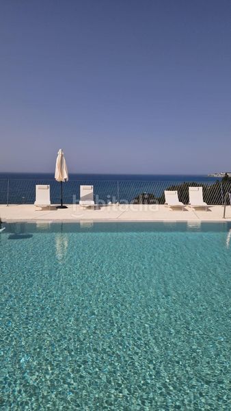 Foto a0f72e03-b073-49bd-870b-284e9a03dcd3. Doppelhaus mit heizung parking pool in El Faro de Calaburra - Chaparral Mijas