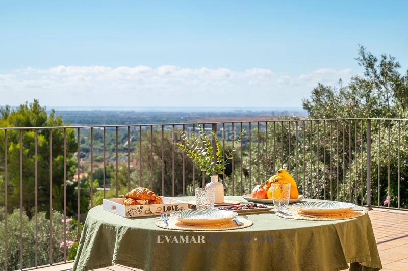 Foto 9e81c17a-b084-44a8-9316-9cab0915a59c. Chalet  unifamiliar con terreno, piscina y espectaculares vistas a las montañas y bahía de palma en Bunyola