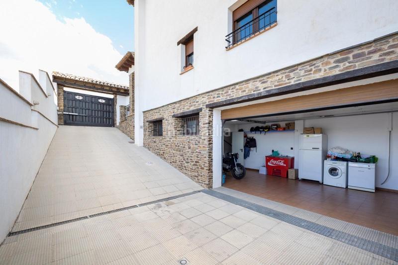 Foto ac445a42-558f-45a4-ab71-f86f7475b016. Chalet con riscaldamento parcheggio piscina in Altos de la Zubia Zubia (La)