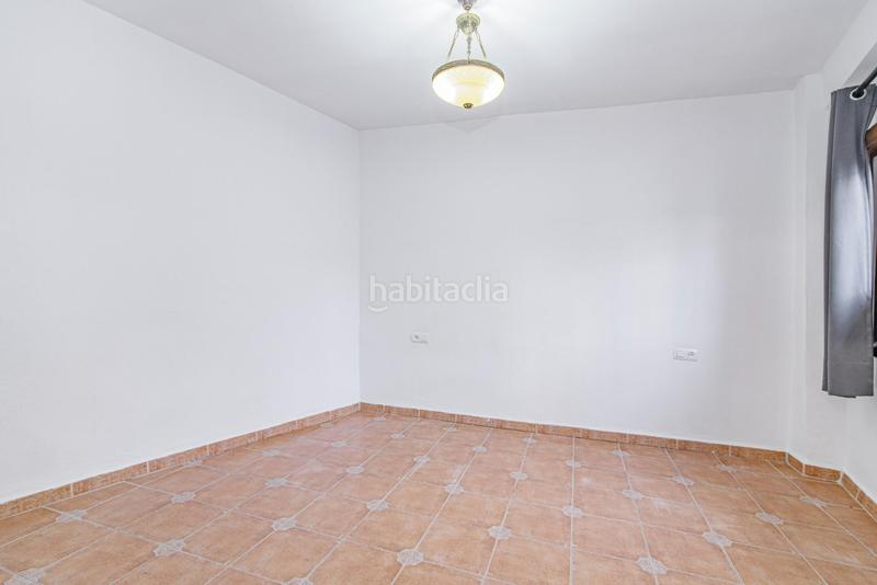 Foto ec0e1da8-5b9d-413a-8859-71b558e6394b. Casa adossada a larga a Polideportivo Alhendín