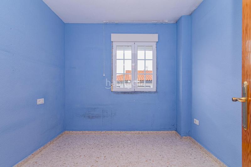 Foto 6366297a-3839-4055-83dd-f36ec14cbcfa. Casa adosada en calle santa clara oportunidad en la zubia! casa adosada con sótano habilitado y terraza en Zubia (La)