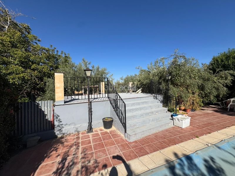 Foto 21ff9e54-517a-481c-bdcc-74ac3d265632. Casa amb piscina a Gójar