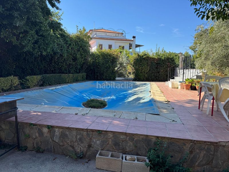 Foto c86c2de8-414c-4bae-b4bd-553bd90d2066. Casa amb piscina a Gójar