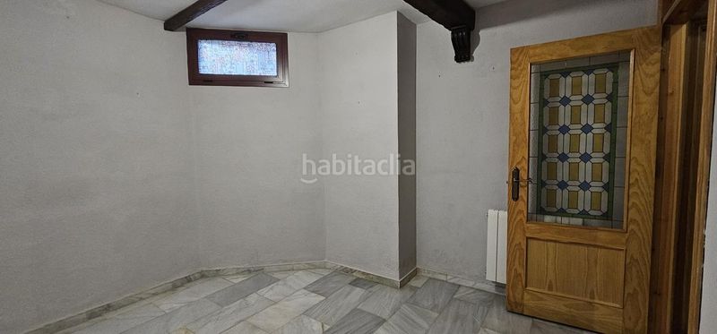 Foto 860cb282-e3e8-49b2-b4ec-9e0b0215f7a2. Casa adossada amb calefacció aparcament a Maracena
