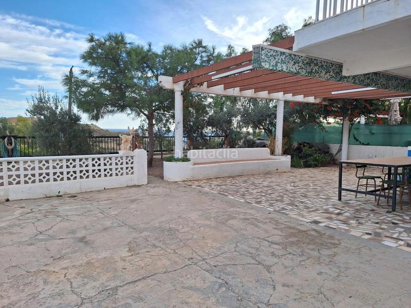 Foto 0129308f-adff-467e-a6f2-4f9a21b0d72d. Casa a schiera con parcheggio in Pueblo Acantilado-Lanuza Campello (el)