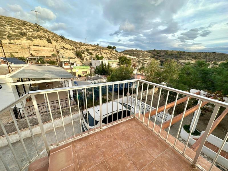 Foto 2e2c55cc-17c6-49ab-9006-fcfa0d9c63bc. Casa adossada amb aparcament a Pueblo Acantilado-Lanuza Campello (el)