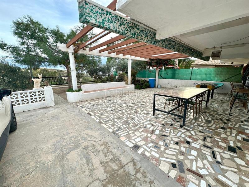 Foto a53500bf-027c-448f-b5b2-8619a0ea1b5a. Casa adossada amb aparcament a Pueblo Acantilado-Lanuza Campello (el)