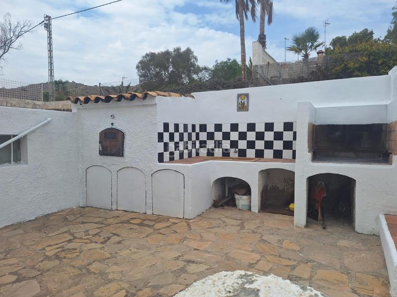 Foto a82fc4e4-f31c-491f-9830-58dd55c2527a. Casa a schiera con parcheggio in Pueblo Acantilado-Lanuza Campello (el)