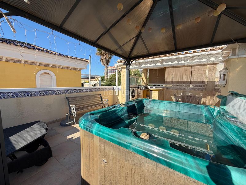 Foto b79dc6ea-bd56-4ae9-a6b0-6507ae3c6419. Casa adossada amb calefacció aparcament piscina a San Fulgencio