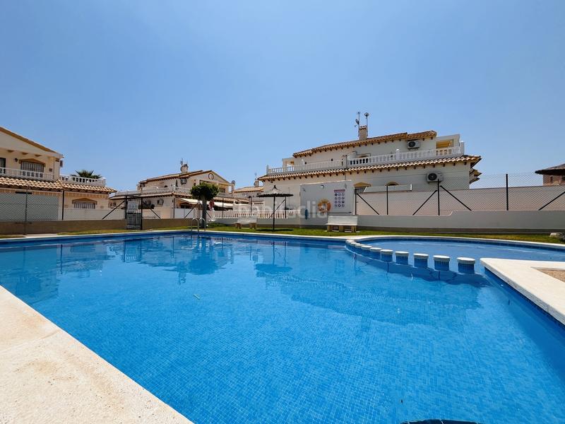 Foto 753fe0ba-b05a-43fe-98c2-157a83795faf. Casa adosada en Playa Flamenca Orihuela