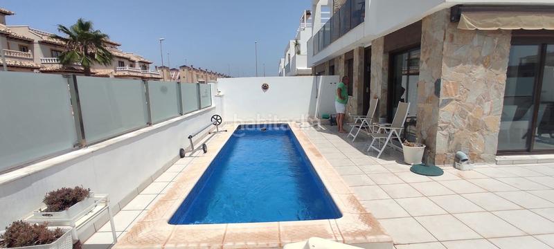 Foto 2066a54b-c4c5-41cb-93d8-54d2ba17a169. House with parking pool in Lomas de Cabo Roig - Los Dolses Orihuela