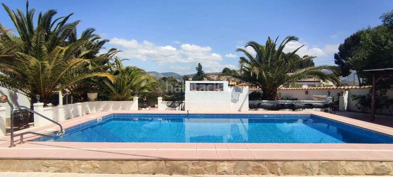 Foto a4c0dbf1-af6a-4fe4-b46d-9989193b2041. Maison avec parking piscine dans Sax