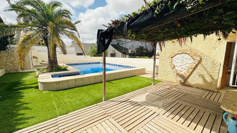 Foto d785dc0d-508a-48f6-aa27-0a257210b001. Casa adossada amb piscina a Los Balcones y los Altos Orihuela