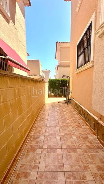 Foto 1b478a42-cdd6-4db1-a773-34ef5b5d4dd9. Semi detached house in Los Balcones y los Altos Orihuela