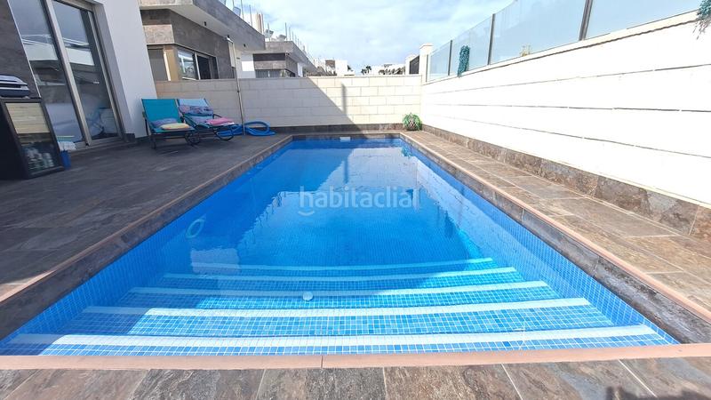 Foto d3c73119-cc64-49dc-bc99-c2cd8ad6a9e1. Maison avec parking piscine dans Lomas de Cabo Roig - Los Dolses Orihuela