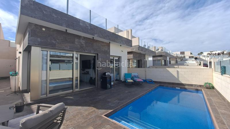 Foto dcd4a22f-9511-4d1f-bbf5-7bd3561f395d. Maison avec parking piscine dans Lomas de Cabo Roig - Los Dolses Orihuela