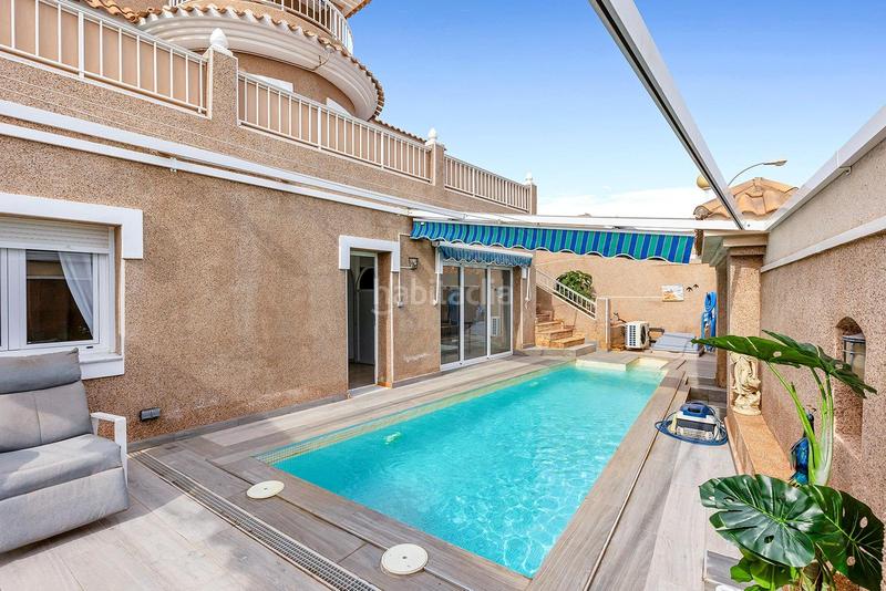 Foto f8fe0887-d5d8-4646-9c09-0b4d94181a54. Casa amb piscina a Los Balcones-Los Altos Torrevieja