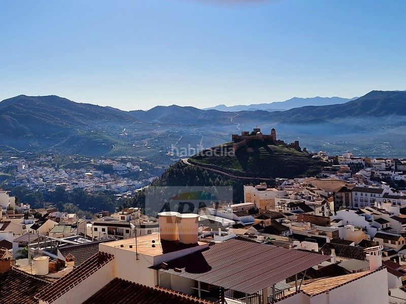 Foto e4be843f-a407-4fe1-b0d8-c7ffe60c9c8e. Casa adossada a Álora