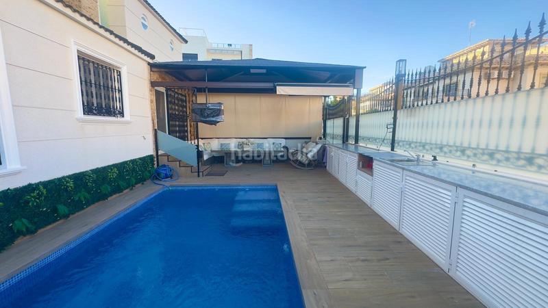 Foto ab4b3761-2836-46ba-9826-930fb6c0dcec. Casa adossada amb piscina a La Zenia Orihuela
