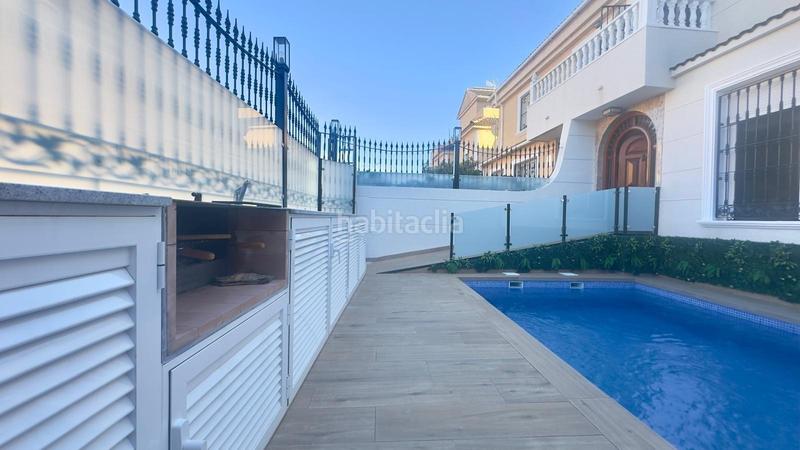 Foto faed12e7-b56a-4e81-8220-729ca5ef57e2. Casa adossada amb piscina a La Zenia Orihuela