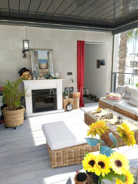 Foto 71e4b427-1a88-4fd7-9621-444b1e5eb333. Maison jumelée dans Campoamor Orihuela