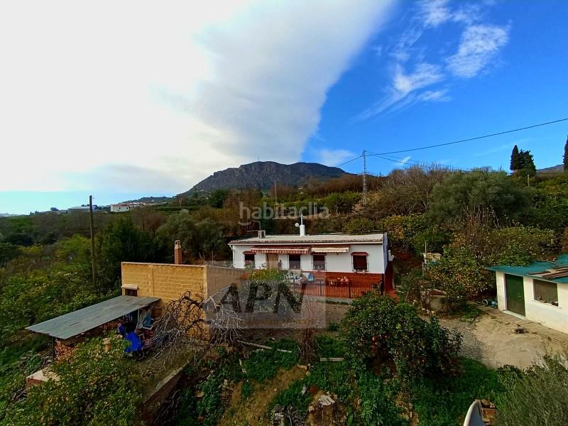 Foto 4f901e74-bf61-4b61-a6b3-3c3e4e9c9819. Casa adossada a Álora