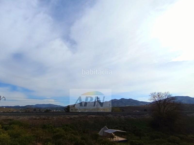 Foto 3f579282-c004-492a-ad65-0daeb757be8e. Reihenhaus in Álora