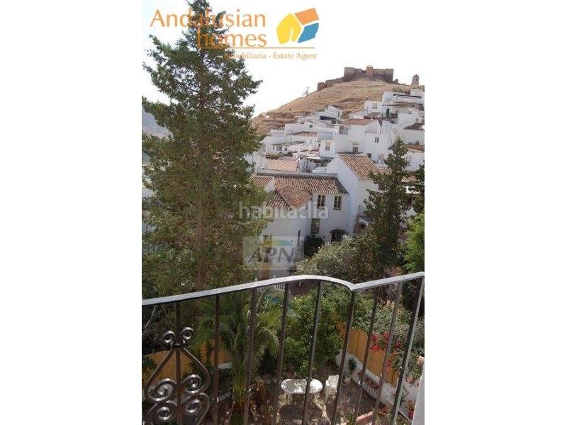Foto 58a2a3be-b4c8-48d2-8cbf-3f47c58f8eb8. Casa adossada a Álora