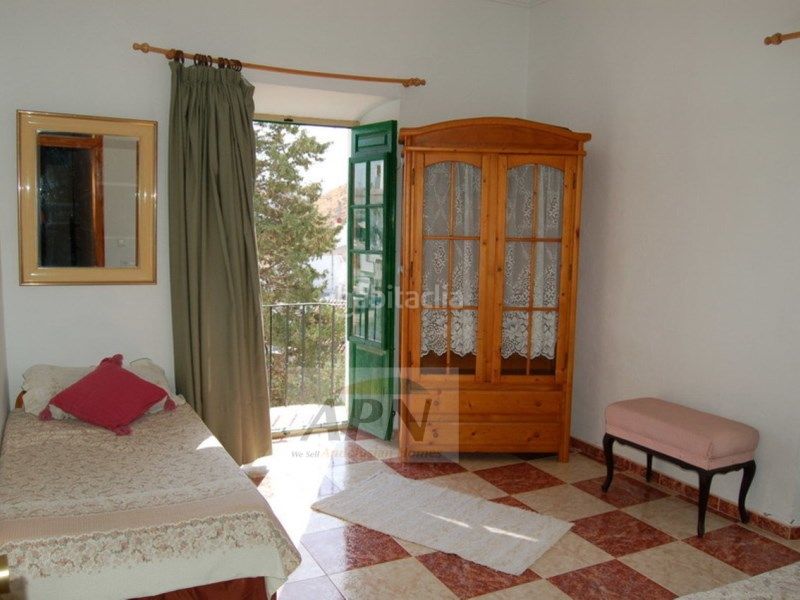 Foto c1ae951e-01ab-436e-8b1b-d3790cdf5b1b. Casa adossada a Álora