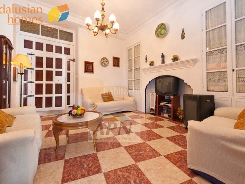 Foto f0fc4558-8dc6-43e2-8291-635ee9a5bad8. Casa adossada a Álora