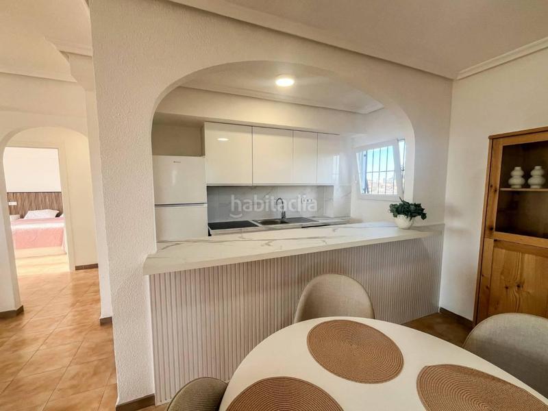 Foto f3196388-471e-4834-aae1-517dc405f2b1. Apartment in Punta Prima Torrevieja