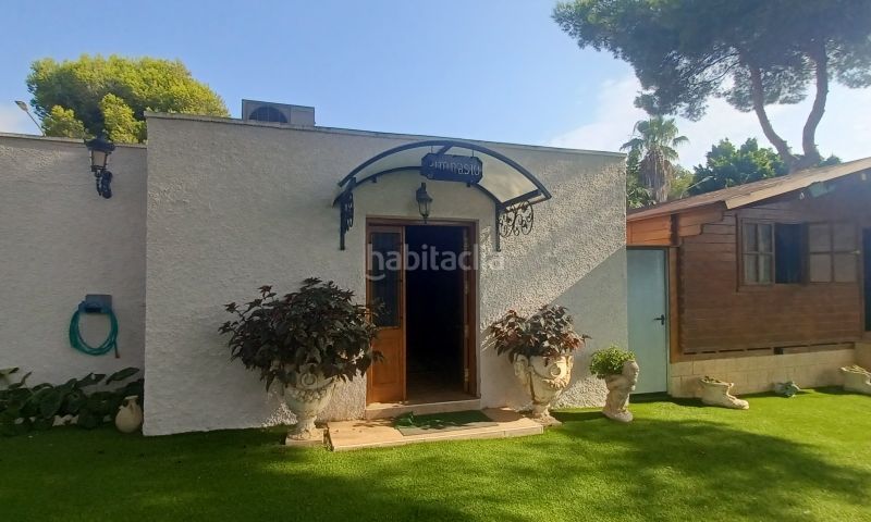 Foto f1946b74-7eb4-4d26-bb0a-b3d958916726. Casa amb aparcament piscina a Campoamor Orihuela